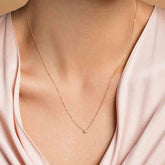 product_details::Circle Necklace on model.