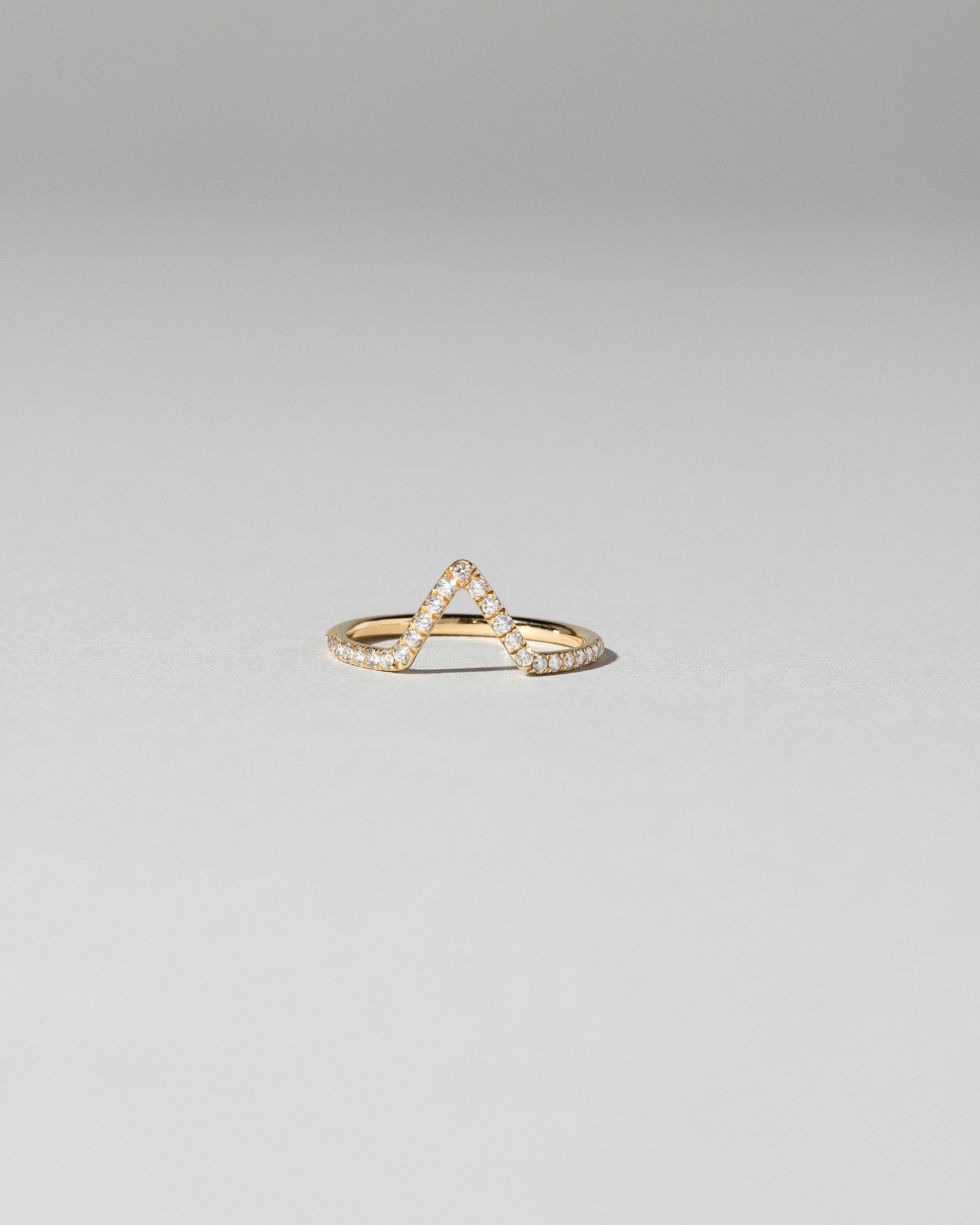 White Diamond Pavé Triangle Band on light color background.