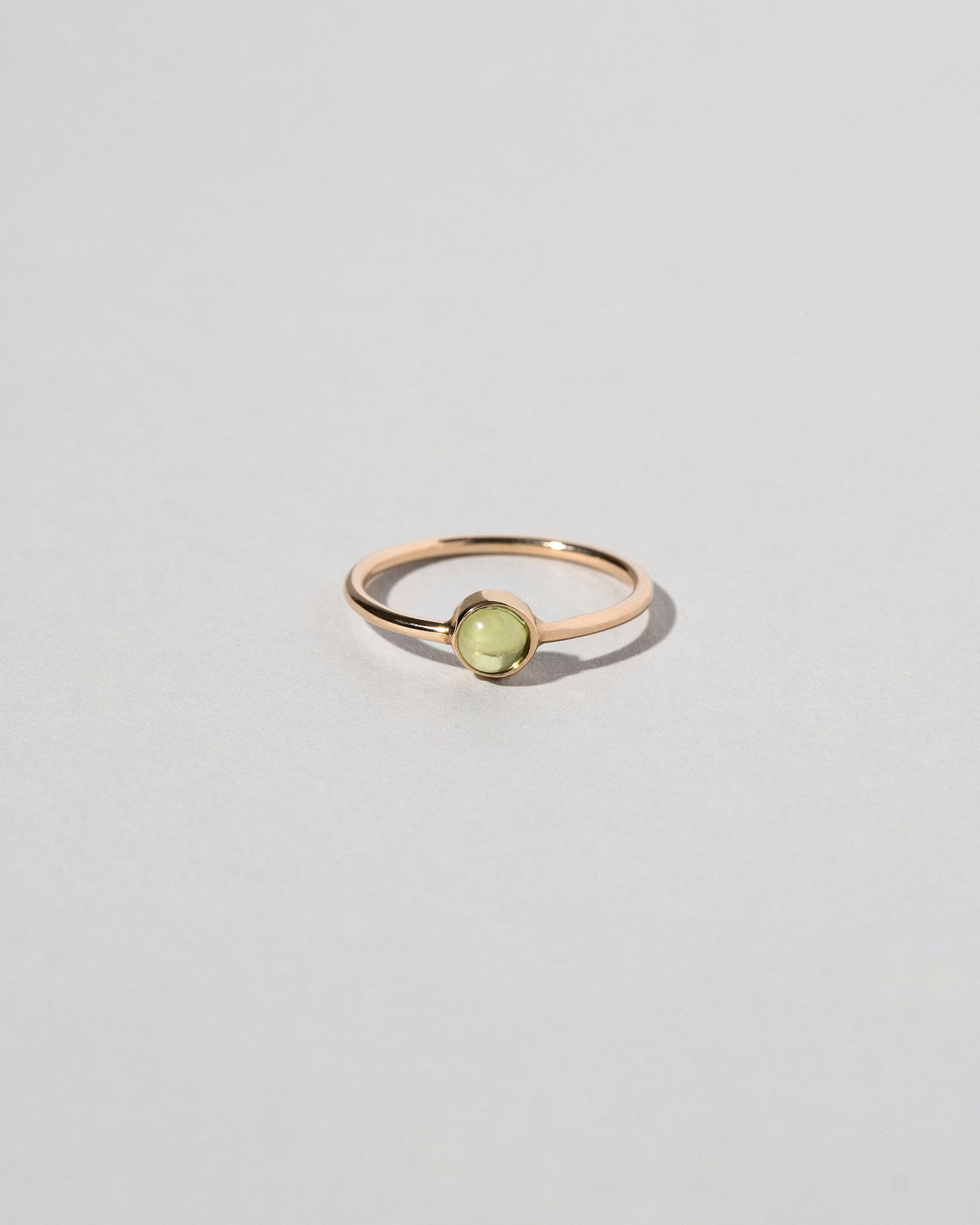Birthstone Ring on light color background.