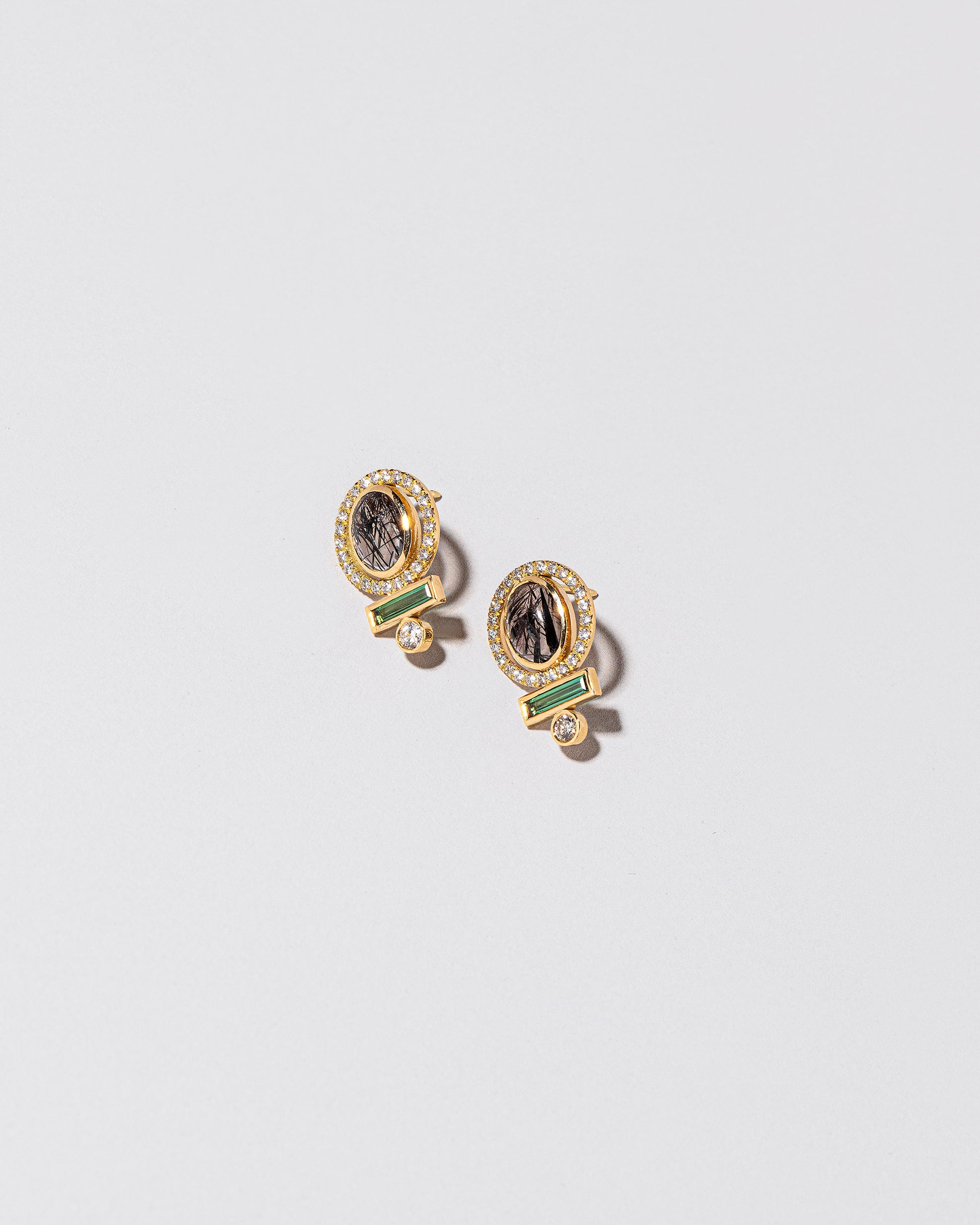 Mystical Change Earring on light color background.