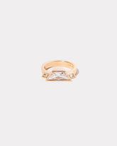 Past Present Future Ring on light color background.