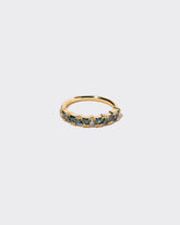Eleven Trillion Ring - Teal Sapphire on light color background.