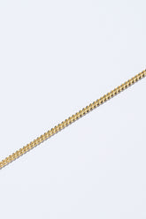 Curb Chain Necklace on light color background.