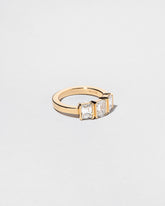 The Puritan 3 Ring on light color background.