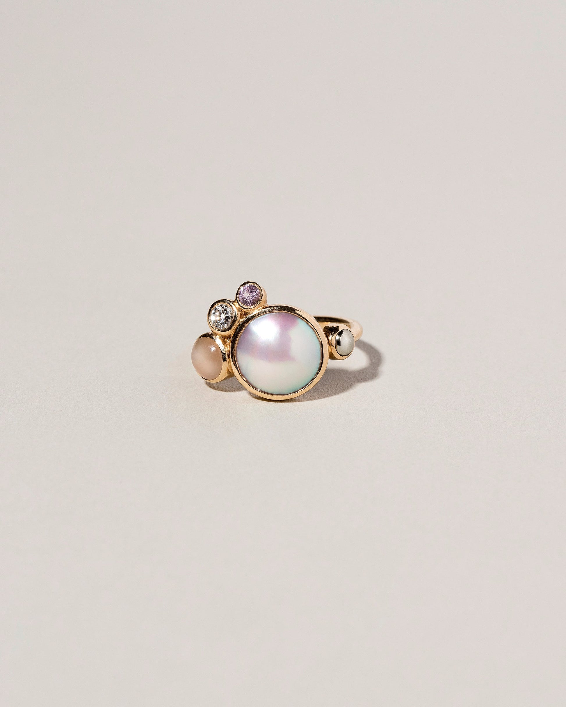 Bubble Cluster Ring on light color background.