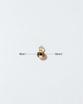 Birthstone Charm on light color background.