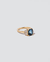 Awakening Ring on light color background.