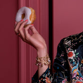 product_details::Sugar Donut Charm on model.