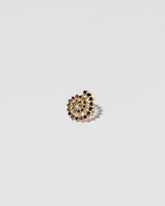 Spiral Earring Single Stud on light colored background.