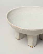Detail view of Nur Ceramics White Volcanic Ritual Bowl on light color background.