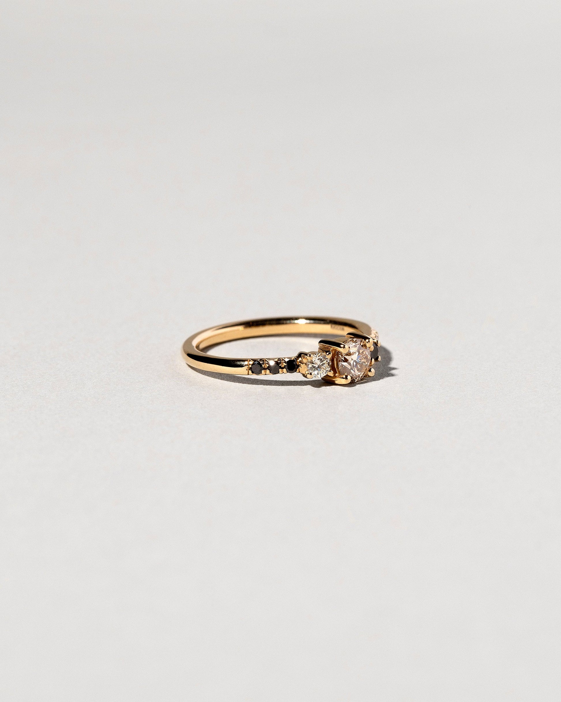 Patira Ring - Champagne Diamond on light color background.