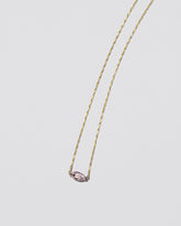 Sweet Heart Necklace on light color background.