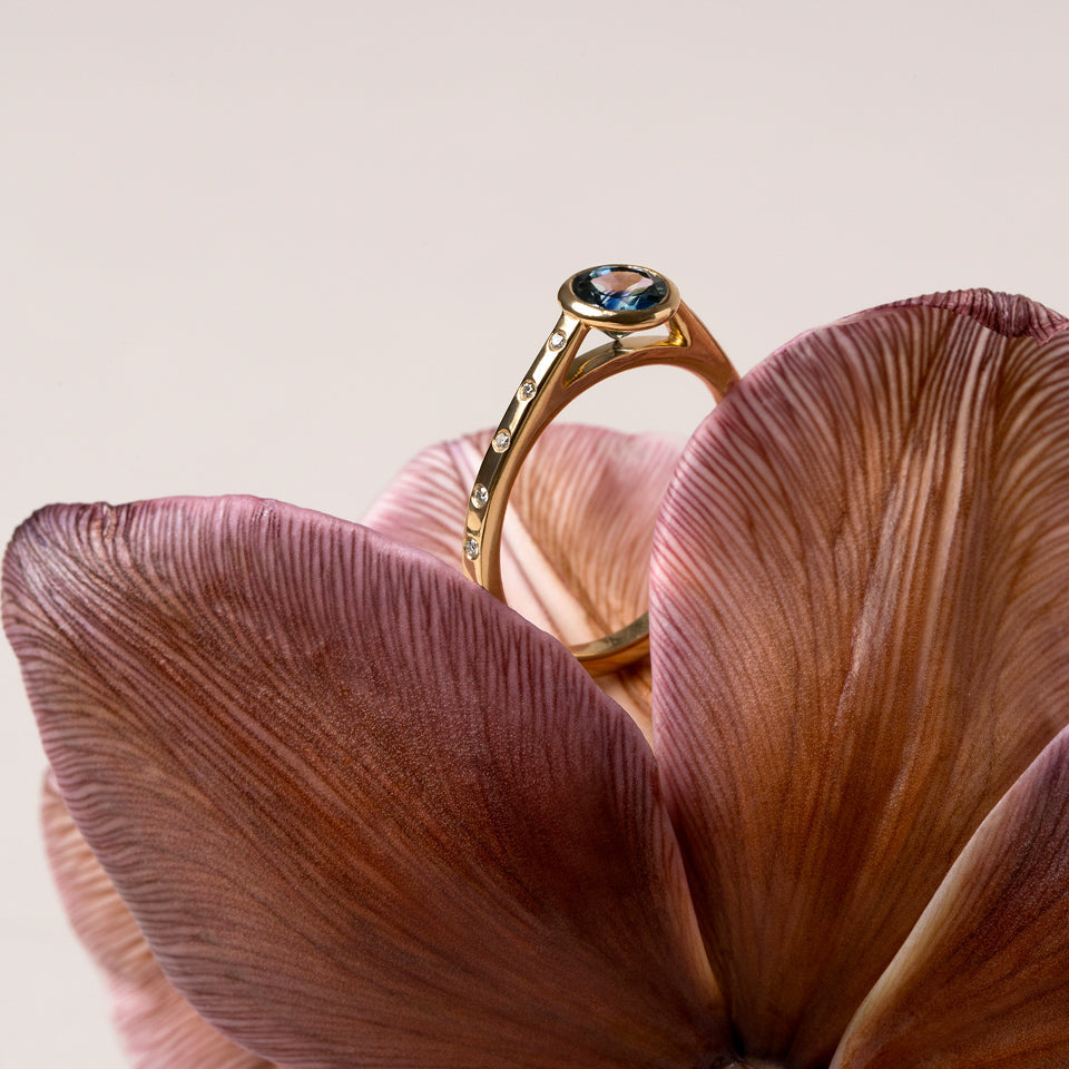 product_details:: Calatrava Ring - Blue Sapphire on light color background.
