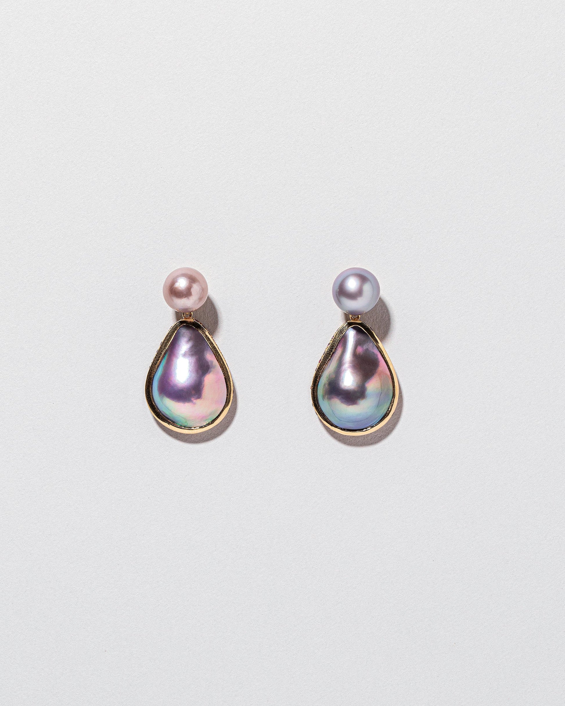 Soft Landscape Earrings on light color background.