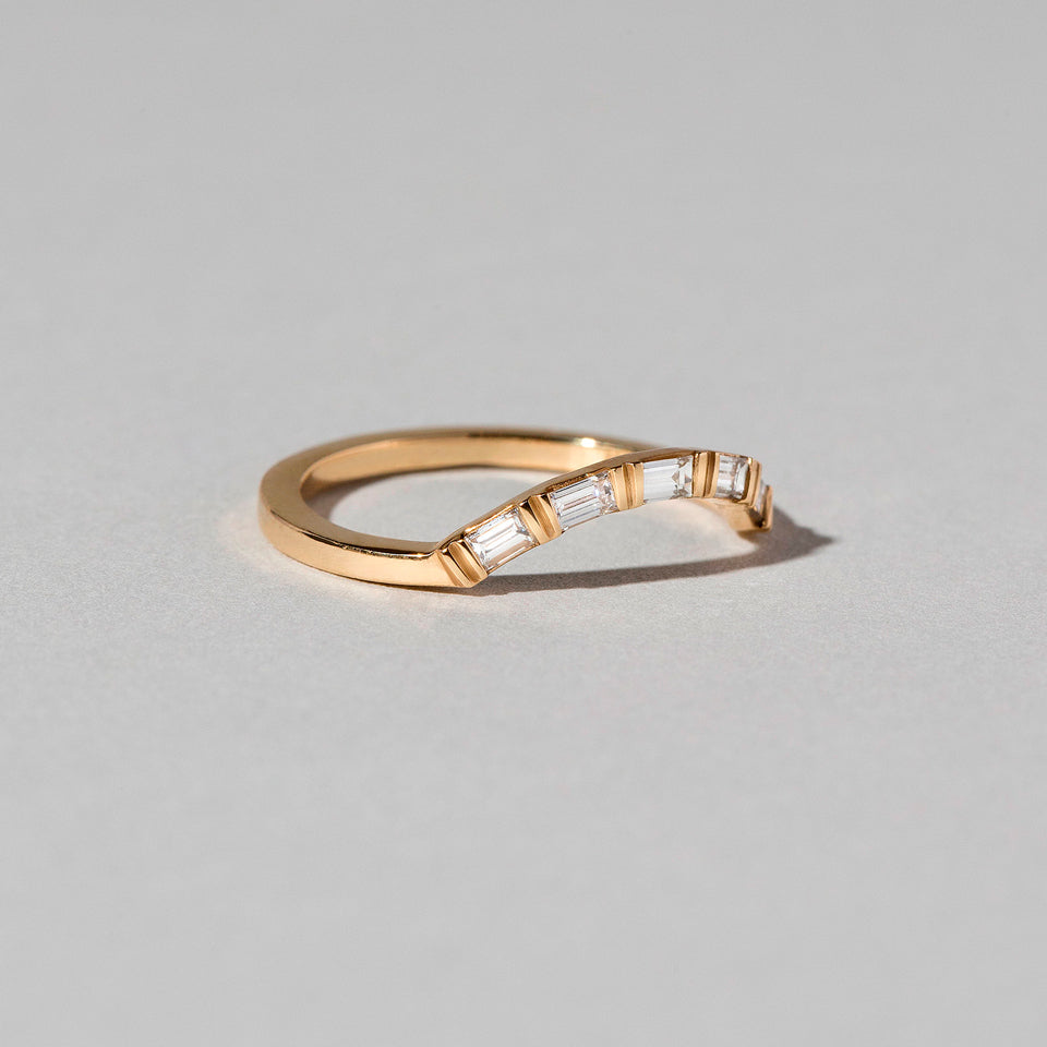 product_details:: Mini Curve Band - Baguette on light color background.