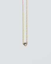 Surgo Necklace on light color background.