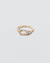 Pursuit Ring on light color background.