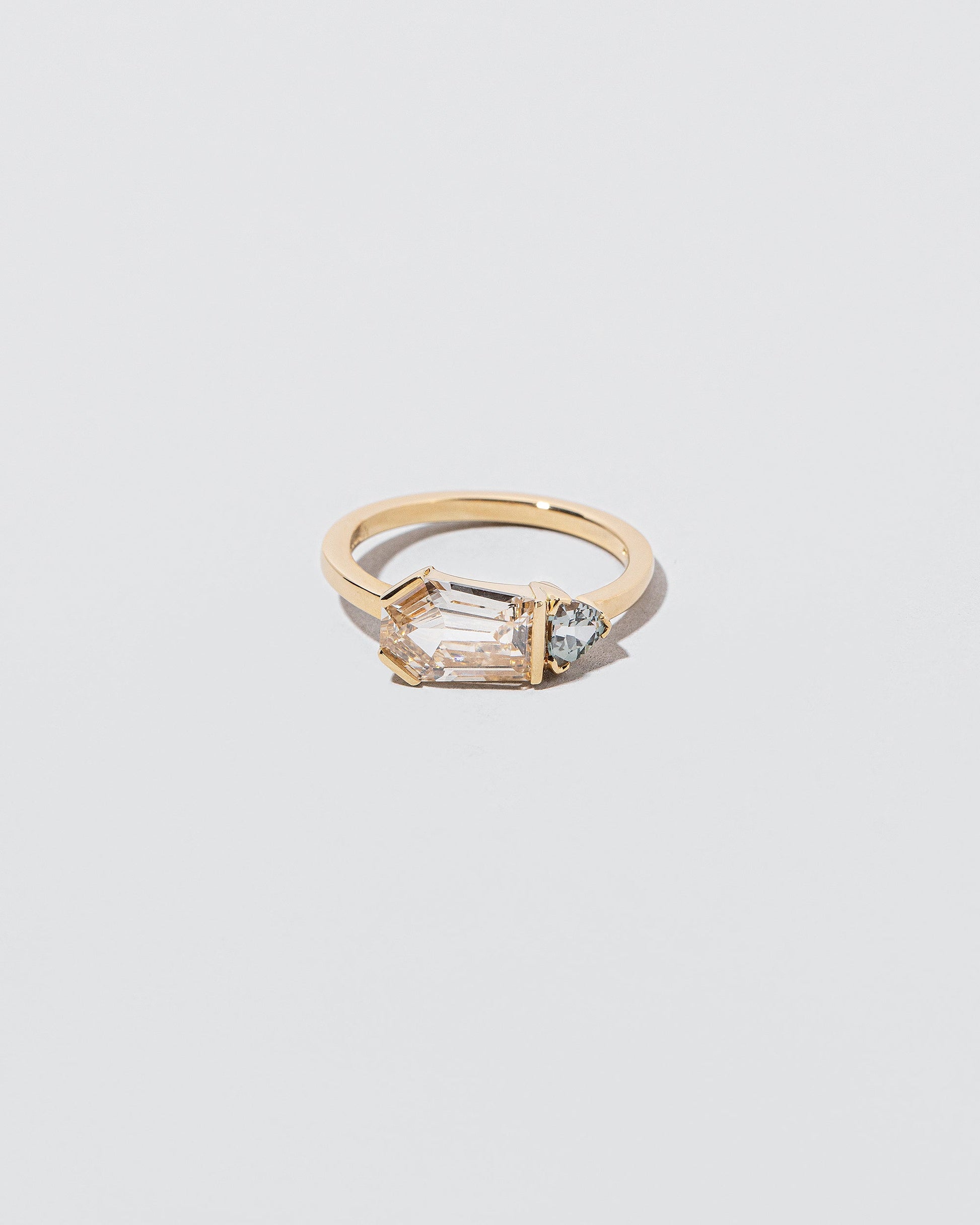 Pursuit Ring on light color background.