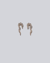 Two Tidal Wave Single Earring on light color background.