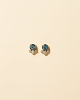 Vega Earrings - Blue Sapphire on light color background.