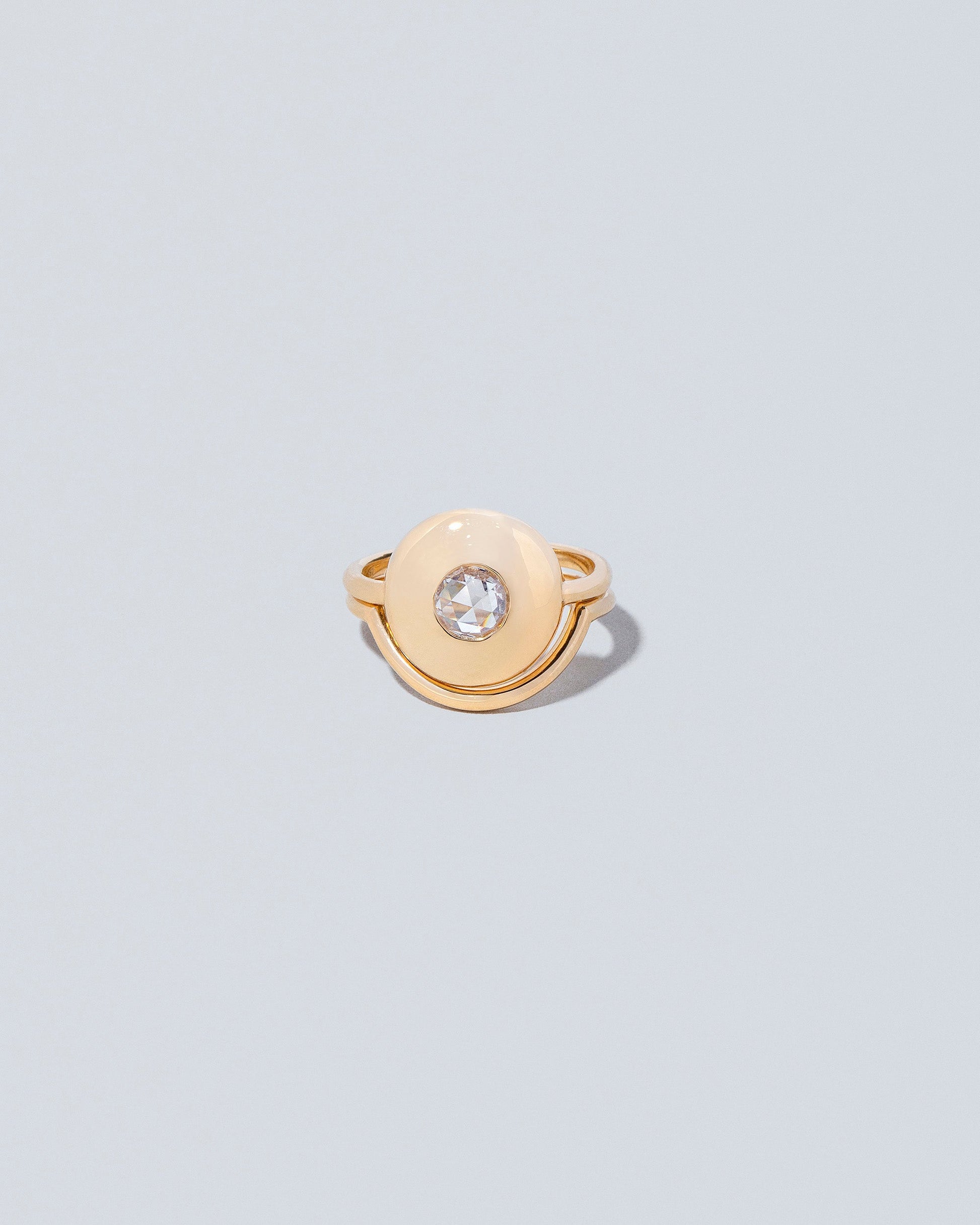 Petite Exposition Ring with Exposition Band on light colored background.