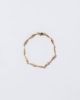 Accumulation Bracelet on light color background.