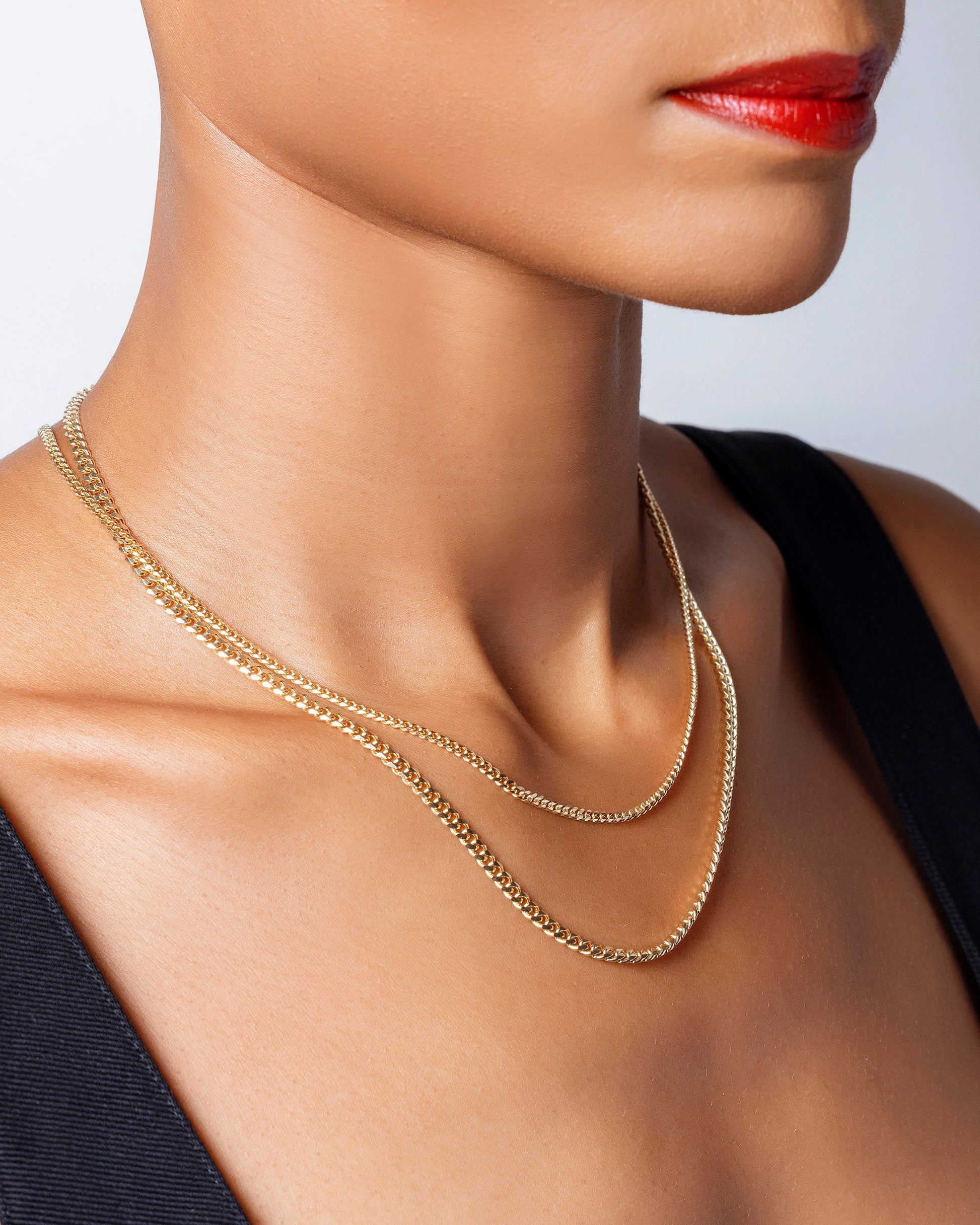 3.4mm Curb Chain Necklace and 2.4mm Curb Chain Necklace on model.