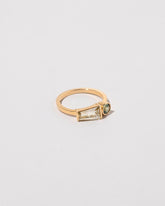 Merret Ring on light color background.