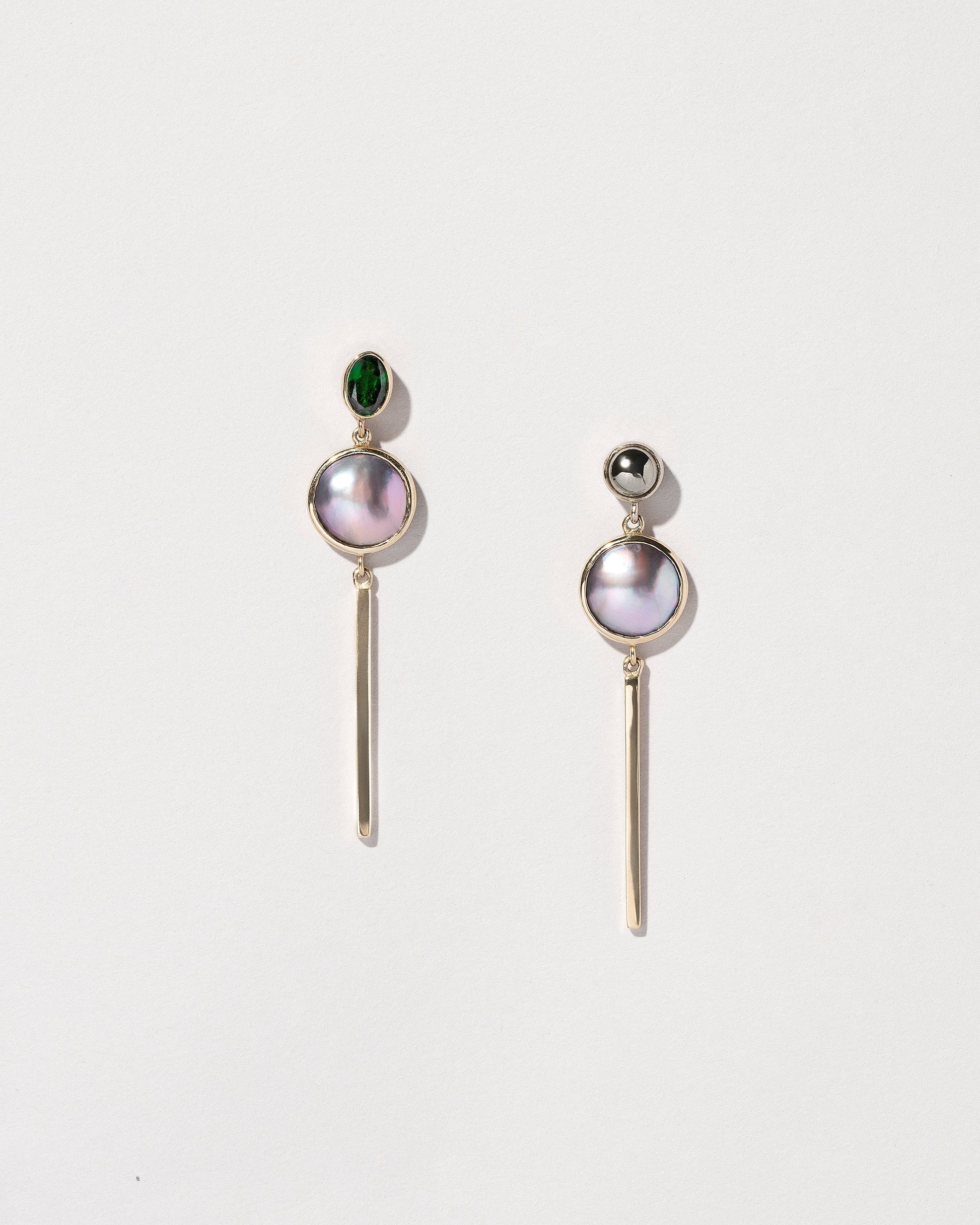 Act 2. Earrings 5 on light color background.