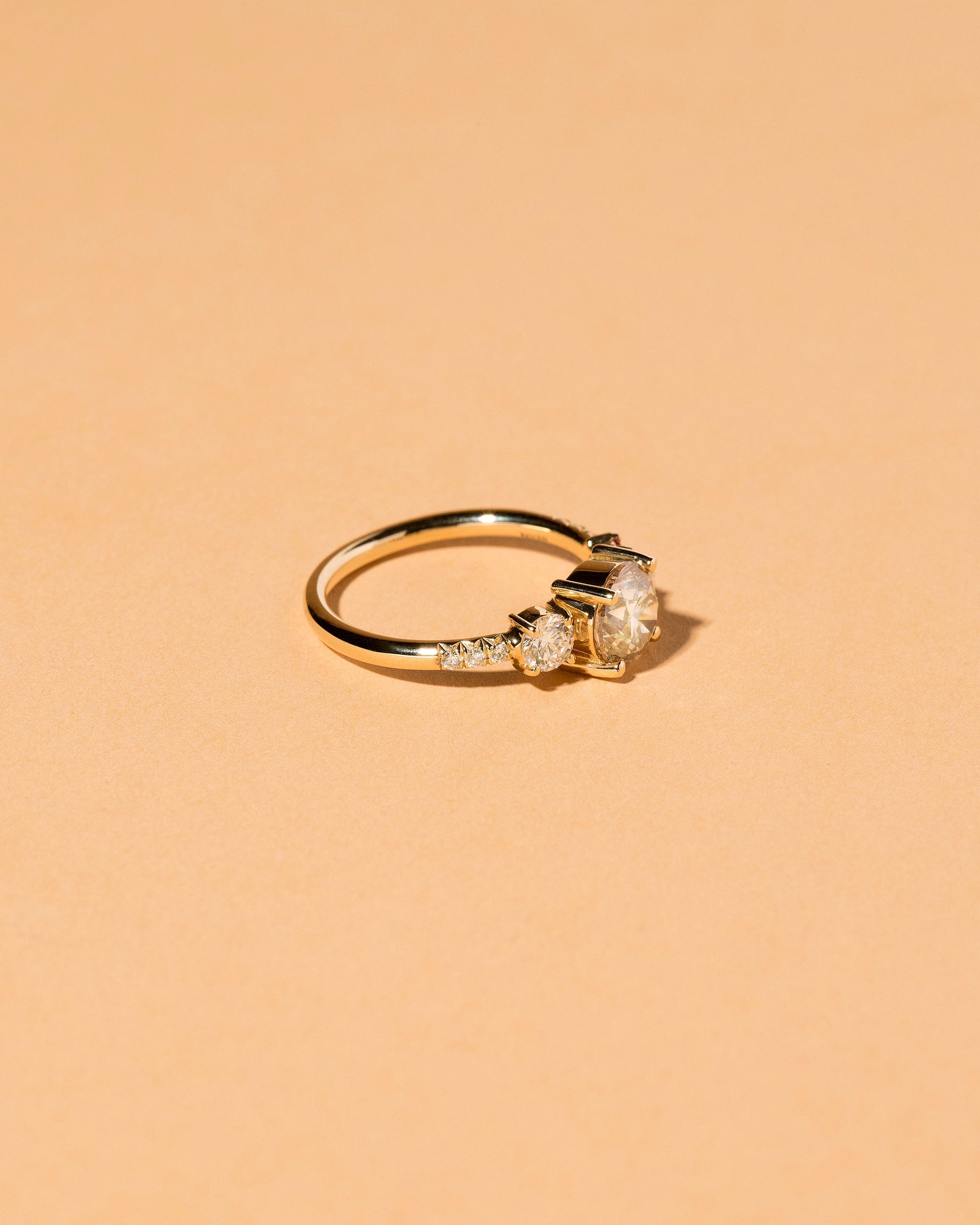 Rhea Ring on light color background.