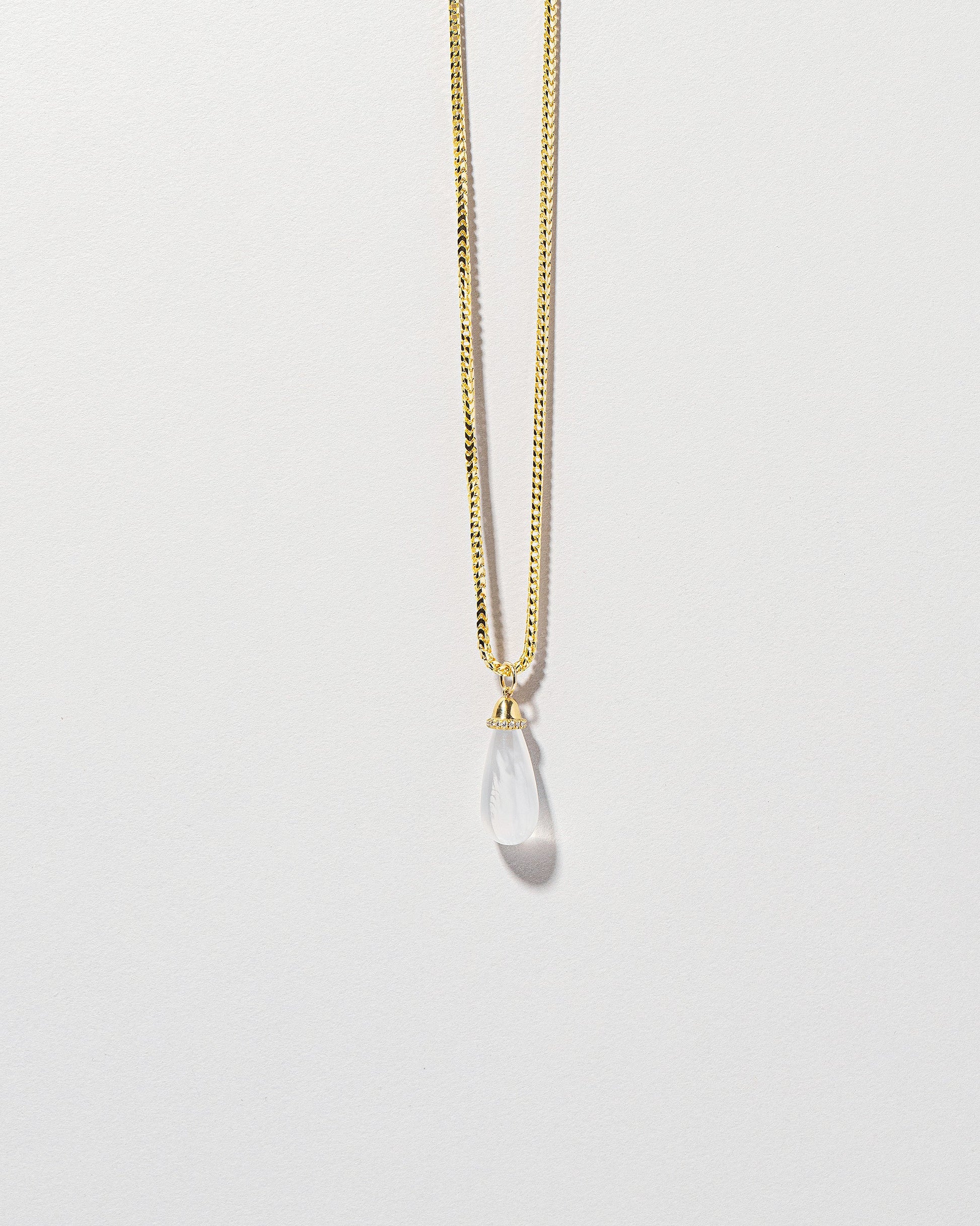 Moonstone Drop Pendant on light color background.