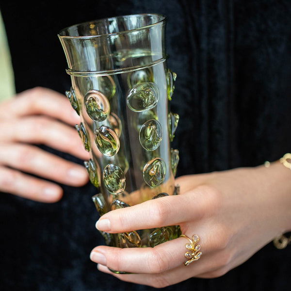 Bollenglass Design Green Dot Water Glass in hand.