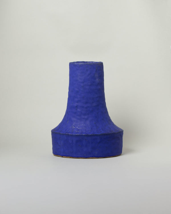 Giselle Hicks Cobalt Blue Oval Swoop Vessel on light color background.