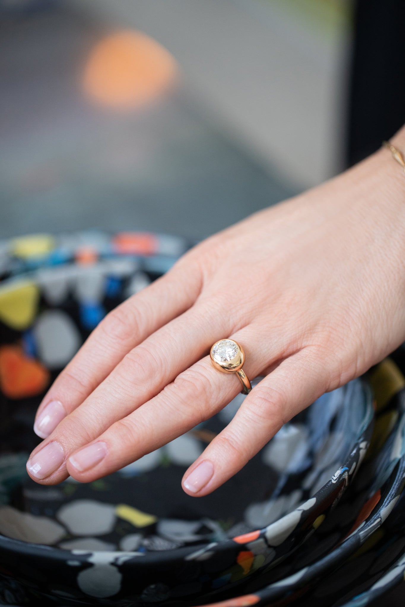 Mociun Collection Engagement Ring on model.