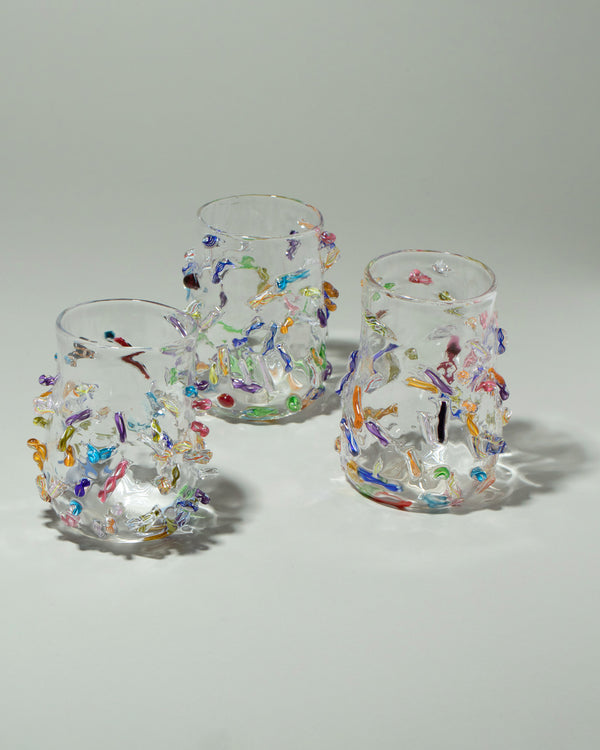 Stover Glass Collection Cane Cups with multicolor details, on a neutral-light background.