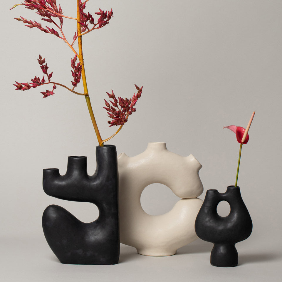Gifts for the Home Over $100 Collection ceramic vases with red botanicals on a neutral-light background.
