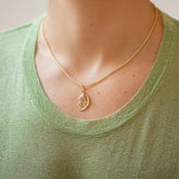 product_details::Abundance Pendant on model.