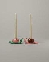 Detail view of the Laetitia Rouget Hard Shell Candle Holder Set on light color background.