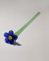 Lucie Claudia Podrabska Cobalt Crystal Glass Flower on light color background.