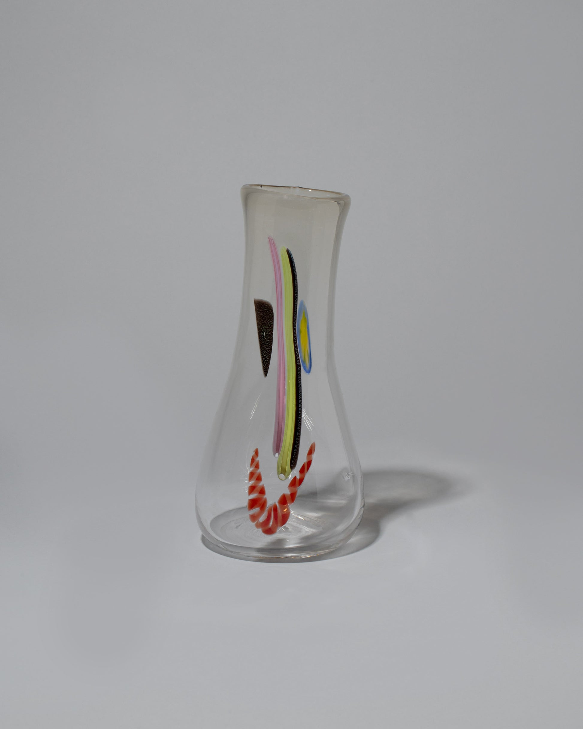 FACEVESSEL Clear Mega Face Vase on light color background.