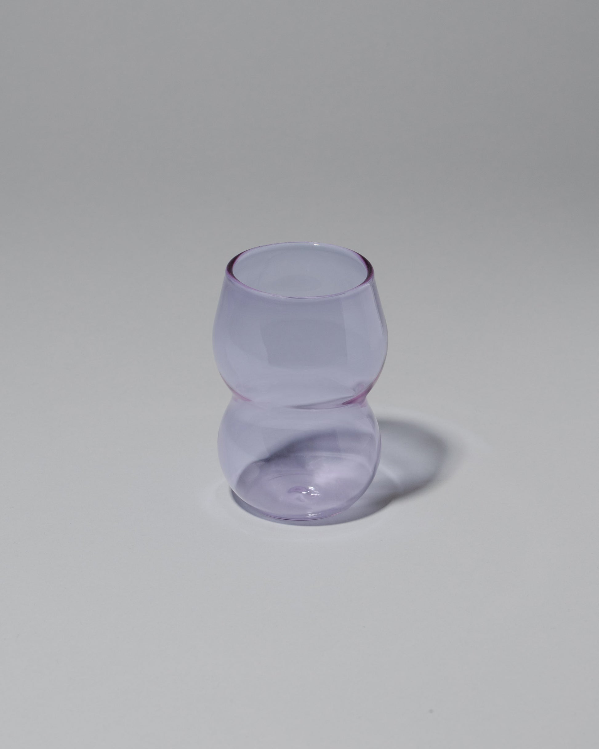 Ornamental by Lameice Lilac Transparent Dreamlike Cup on light color background.