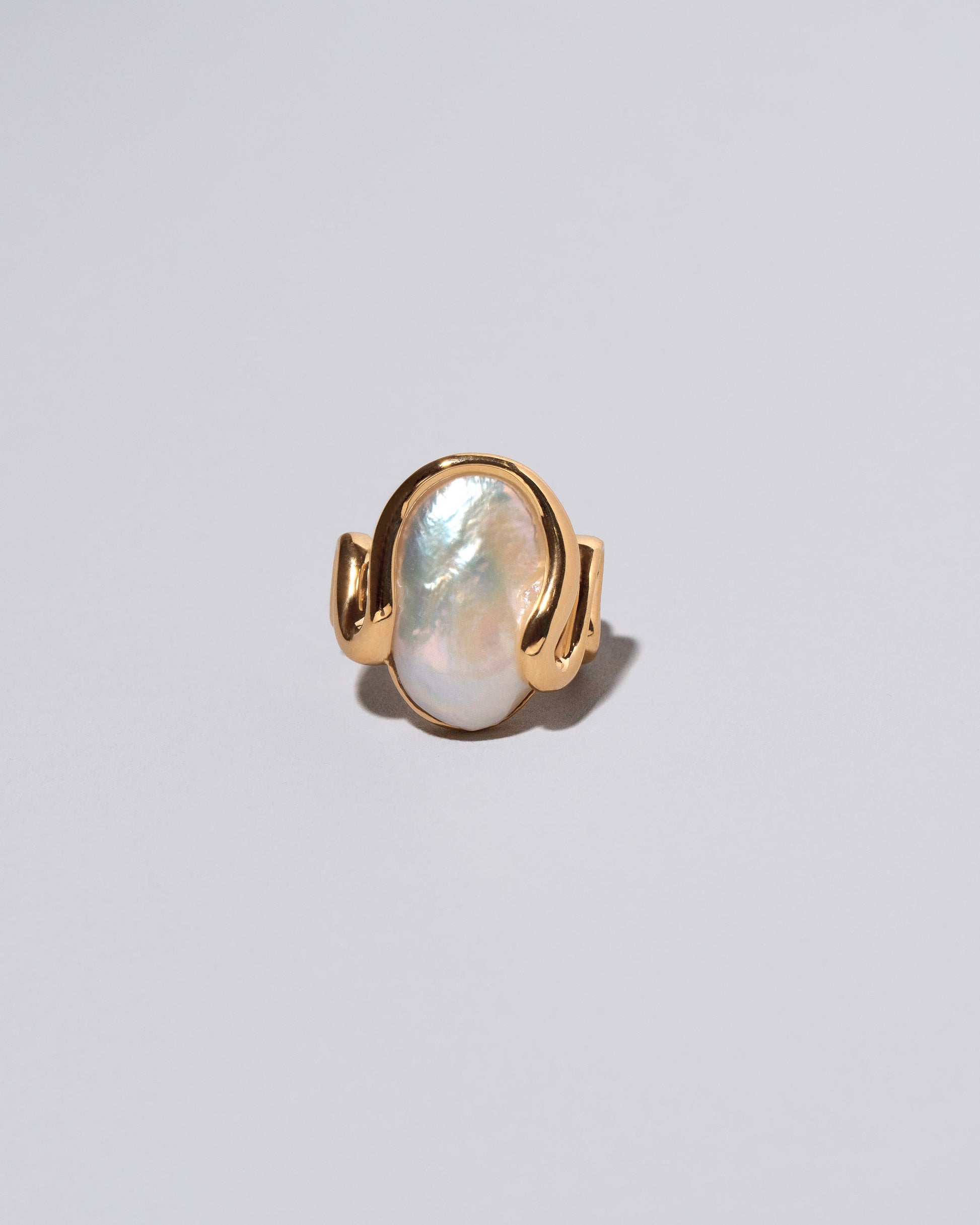 Weaver Ring on light color background.