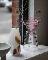 Styled image featuring BaleFire Glass Small White Epiphany Vase.