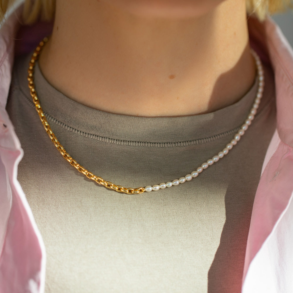 product_details::Half Short Loop Chain & White Seed Pearl Necklace on model.