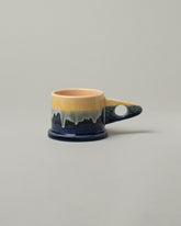 Echo Park Pottery by Peter Shire Indigo Double Dip Mug on light color background.