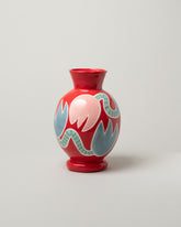 Laetitia Rouget Red Tulip Vase on light color background.