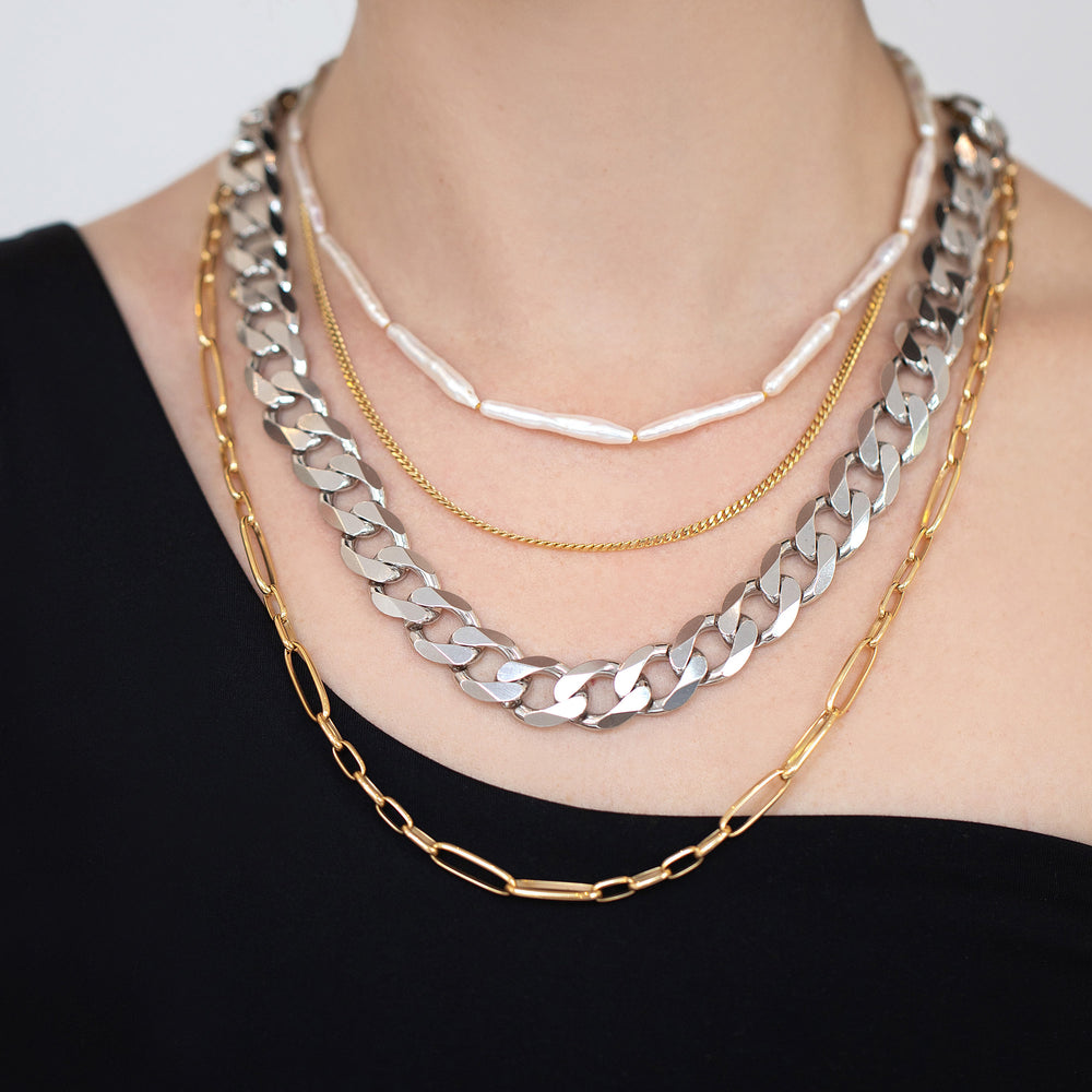 product_details::Silver Diamond Curb Chain on model.