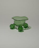 Ornamental by Lameice Green Transparent Dreamlike Honey Bowl on light color background.