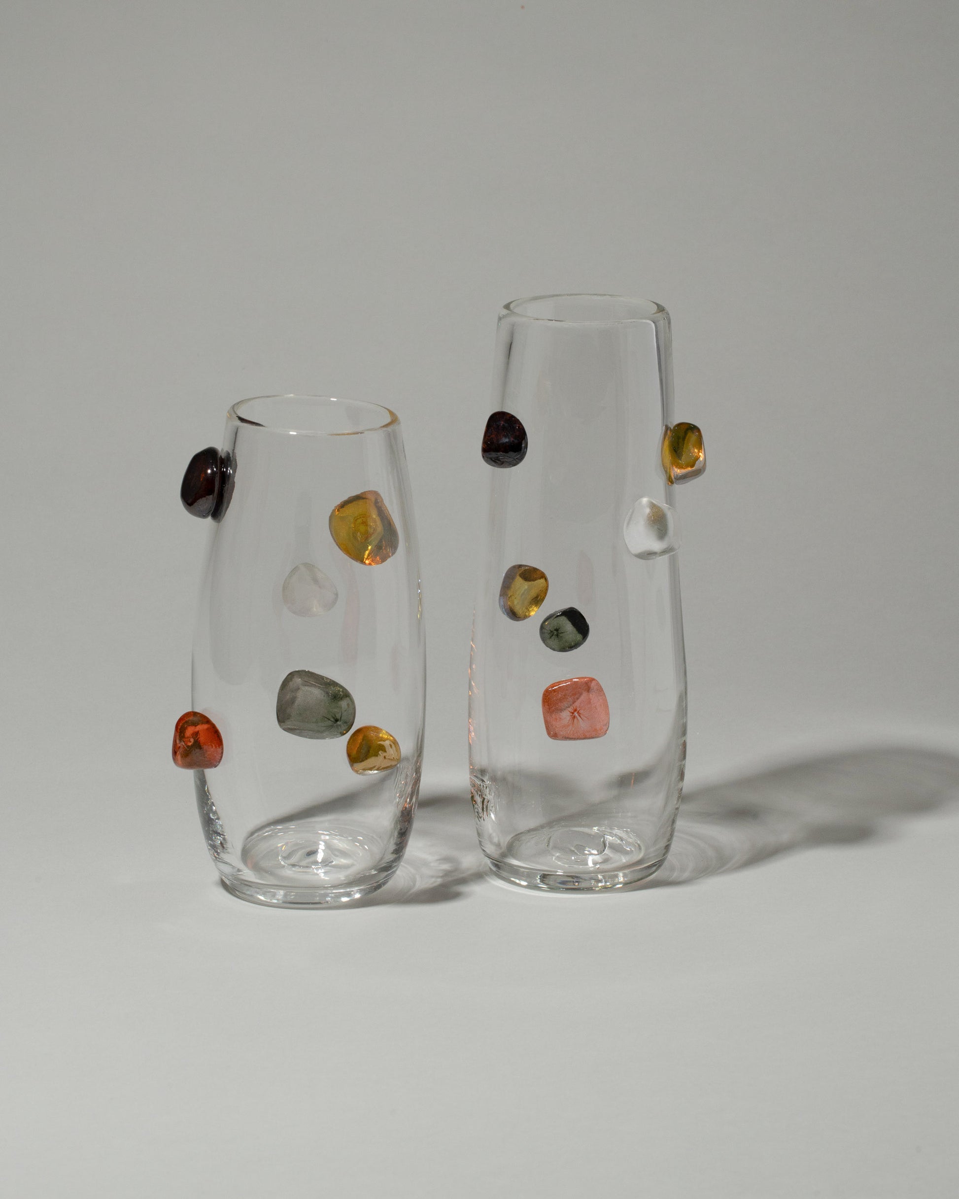 Group of Jess Humphrey Studio Rocks Vases on light color background.