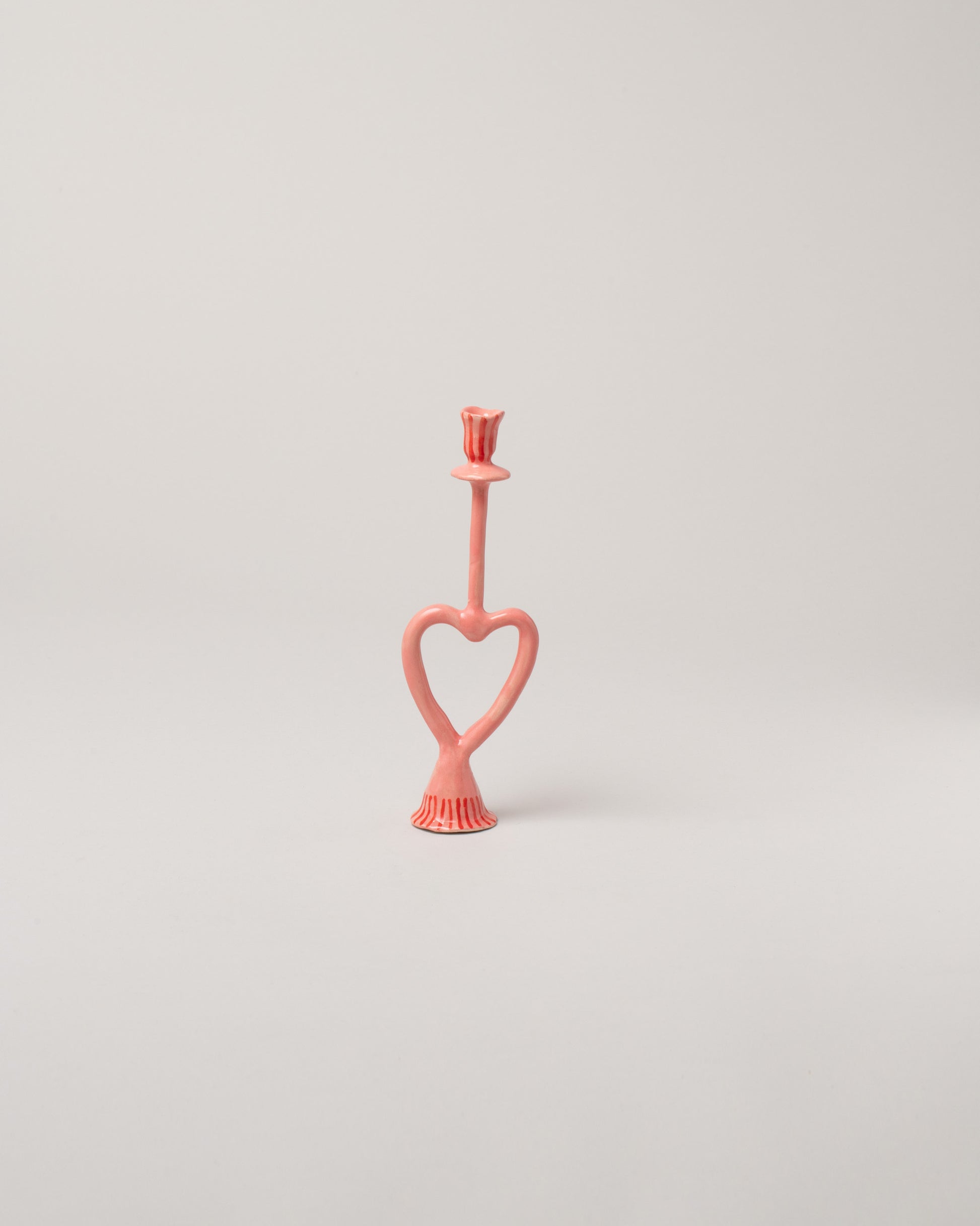 La Romaine Editions Fringe Open Heart-Shaped Candle Holder on light color background.